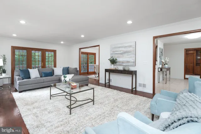 a living room with furniture and a couch