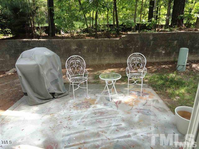 308 Durston Loop Morrisville, NC 27560 - Photo 12 of 13 an outdoor sitting area with furniture