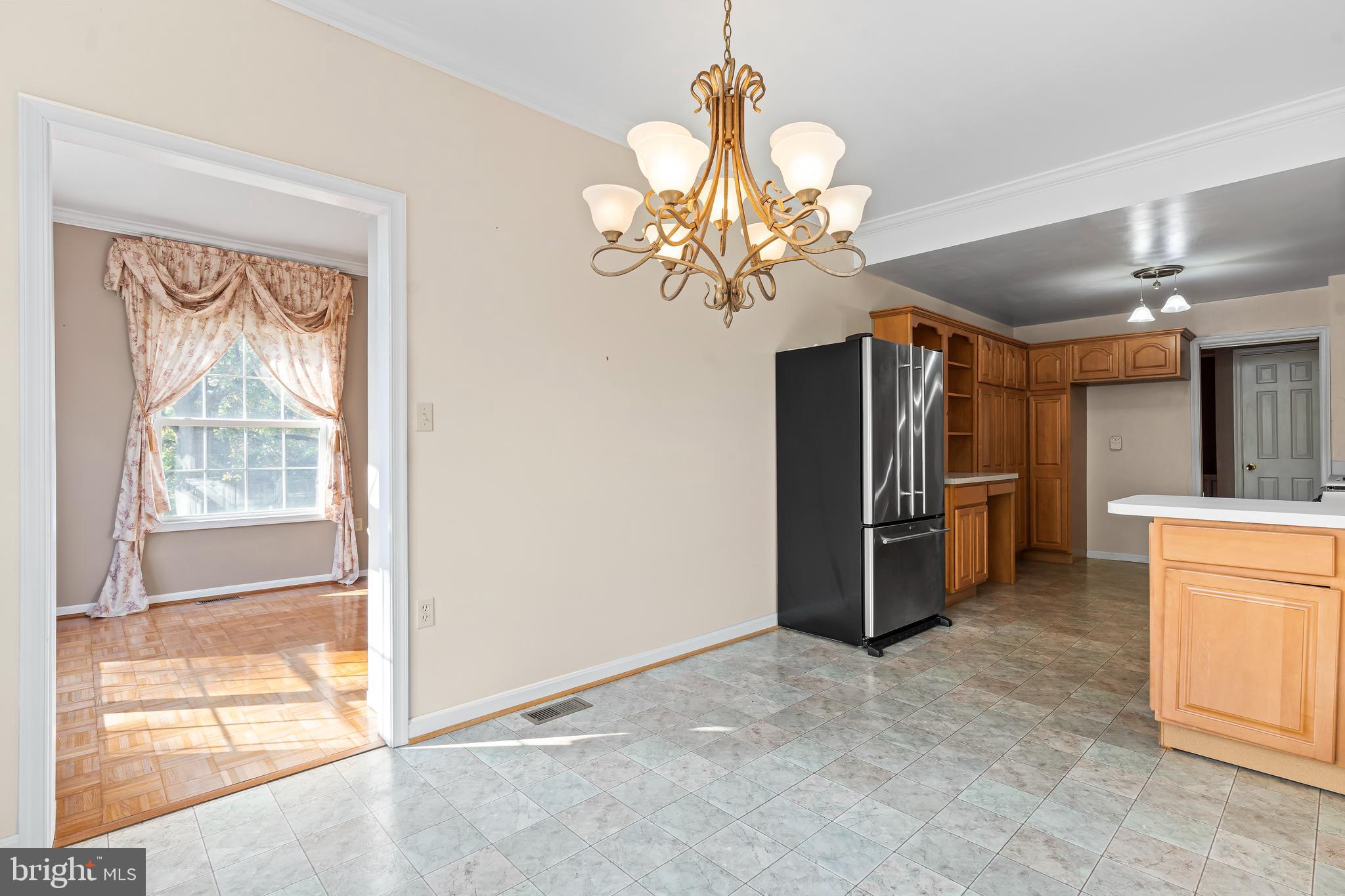 7705 Ridge Road Frederick, MD 21702 - Photo 13 of 51 a view of a livingroom with a chandelier