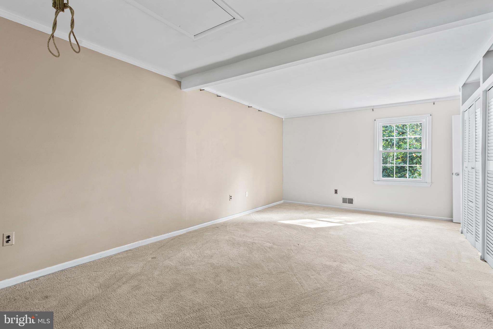 7705 Ridge Road Frederick, MD 21702 - Photo 21 of 51 a view of an empty room with a window