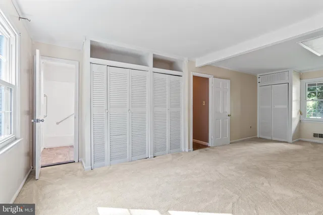 an empty room with windows