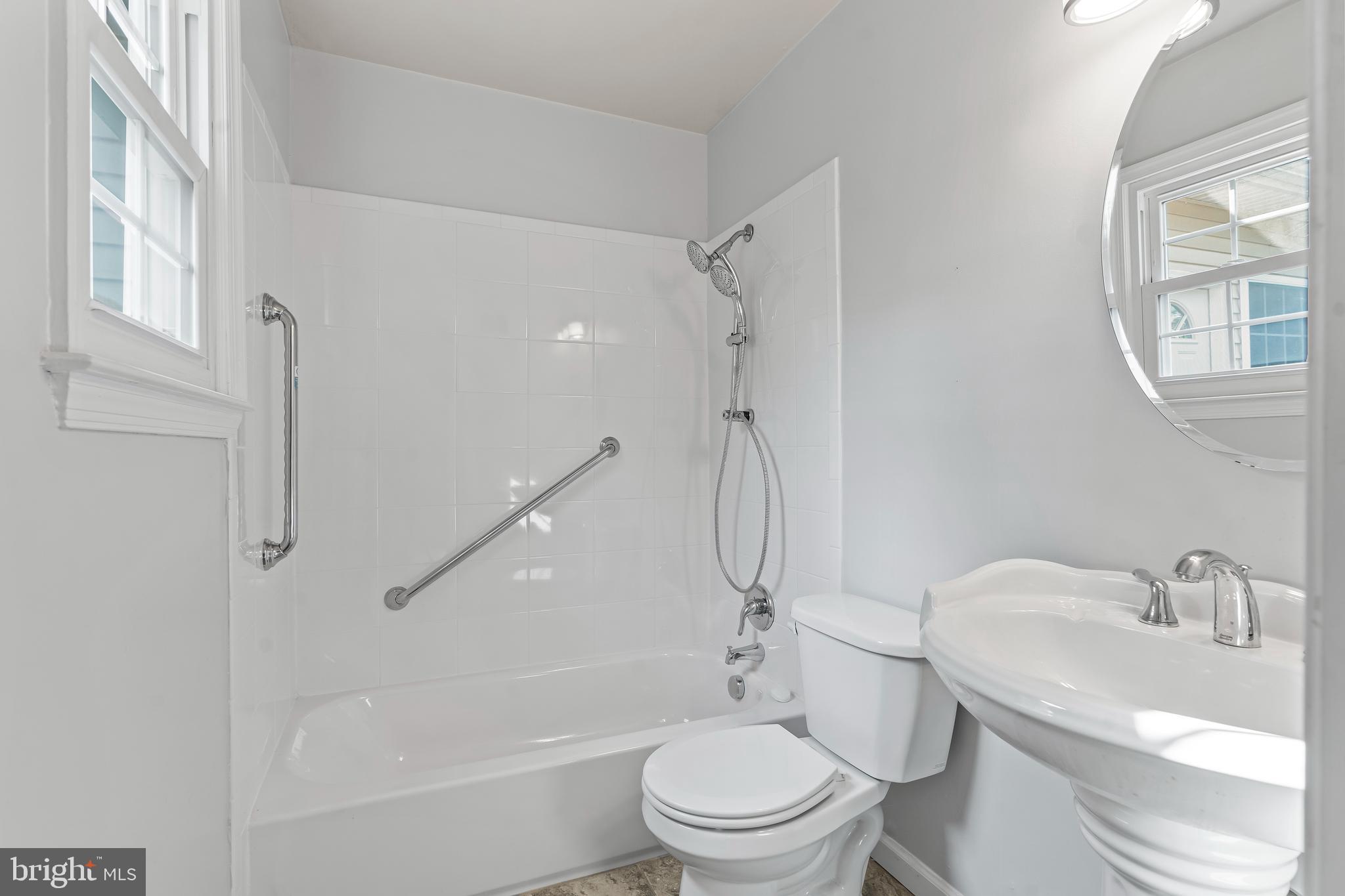 7705 Ridge Road Frederick, MD 21702 - Photo 24 of 51 a bathroom with a sink toilet and shower