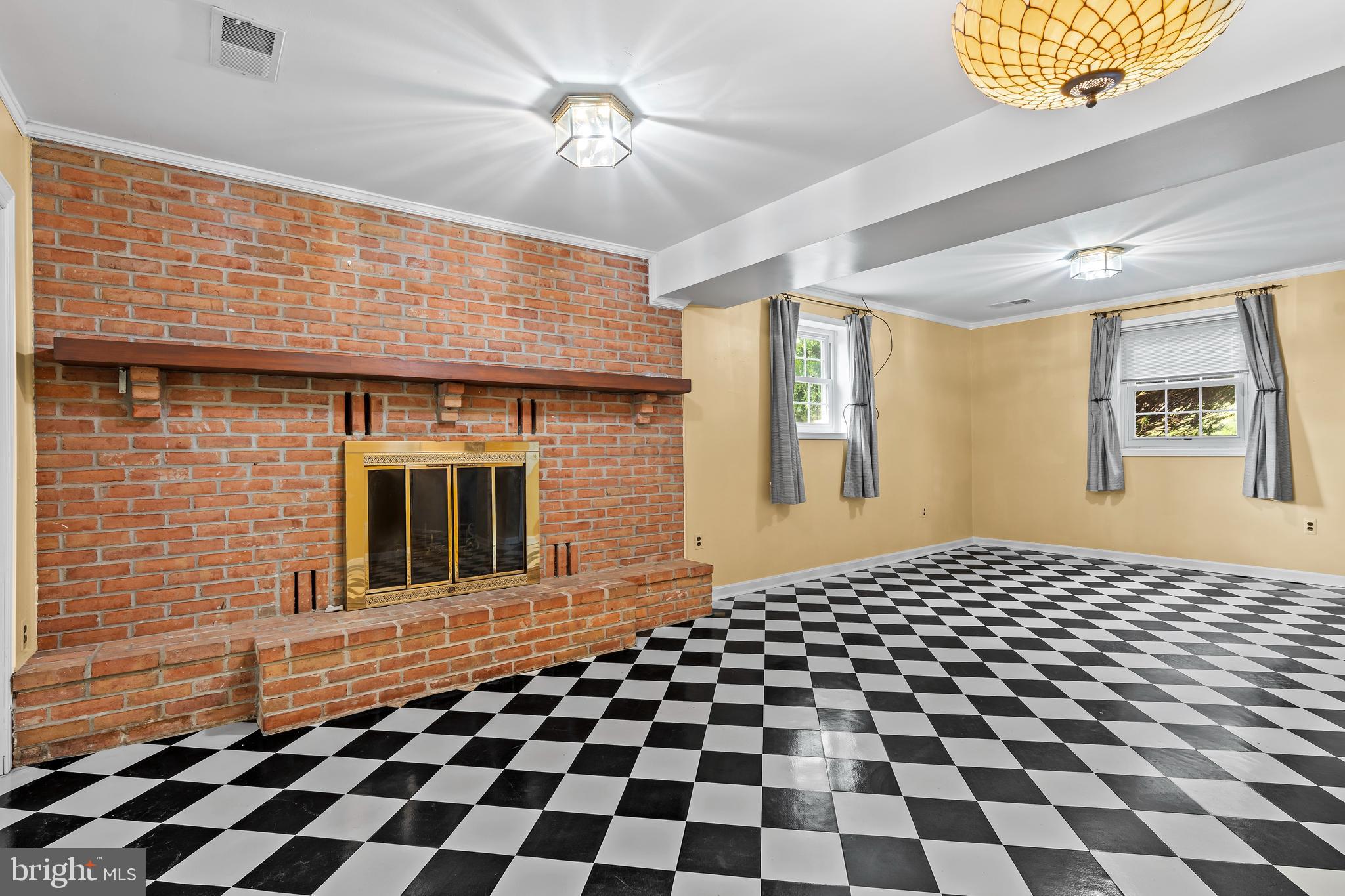 7705 Ridge Road Frederick, MD 21702 - Photo 25 of 51 a black and white checkered floor with a black white checkered floor