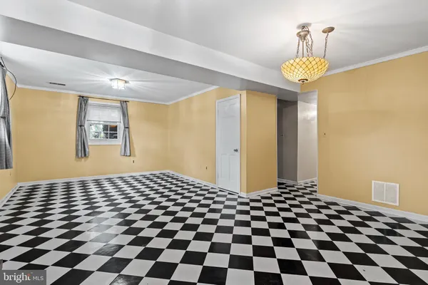 a black and white checkered floor with a black white checkered floor