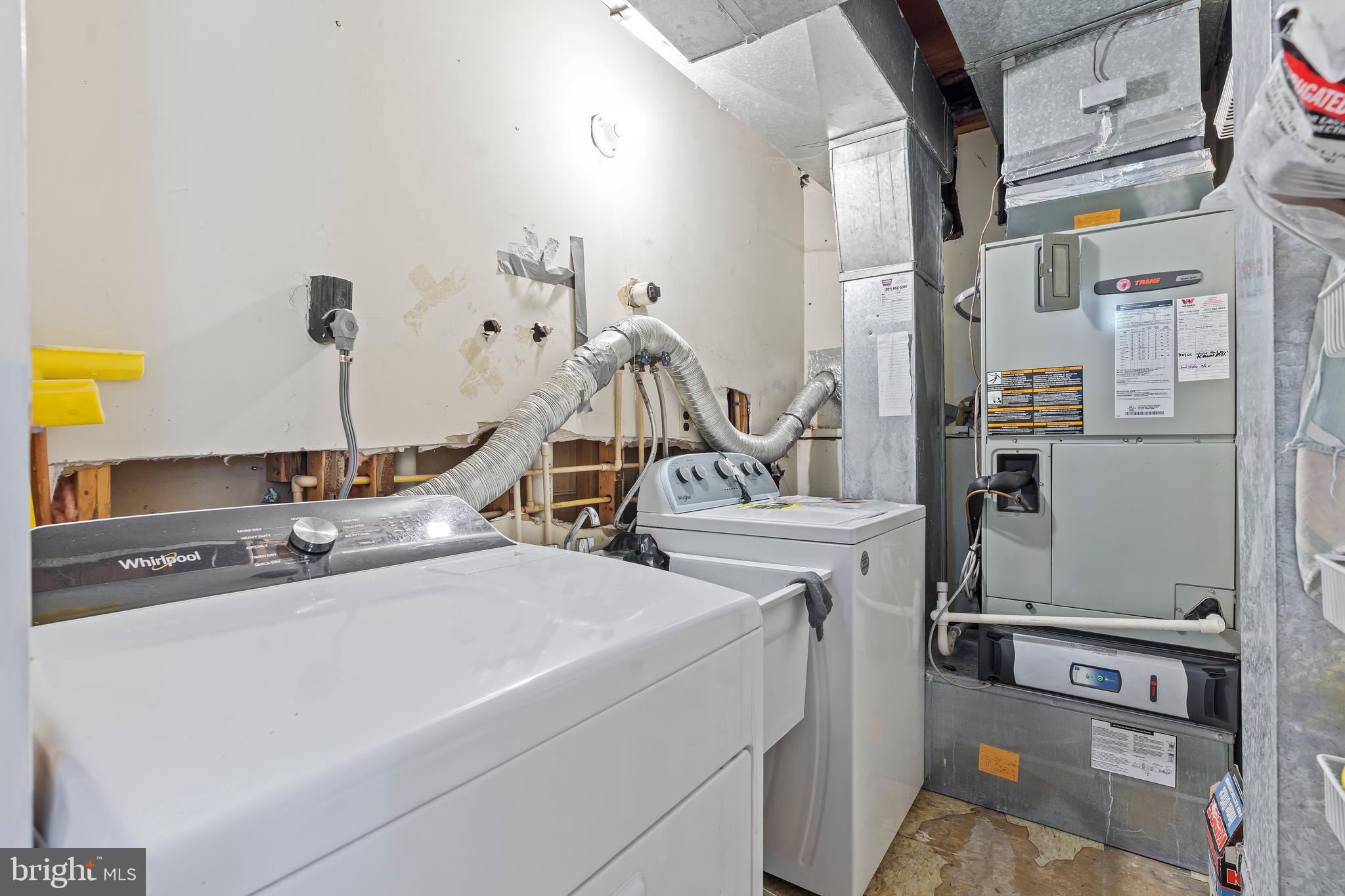 7705 Ridge Road Frederick, MD 21702 - Photo 32 of 51 a view of a kitchen with appliances and cabinets