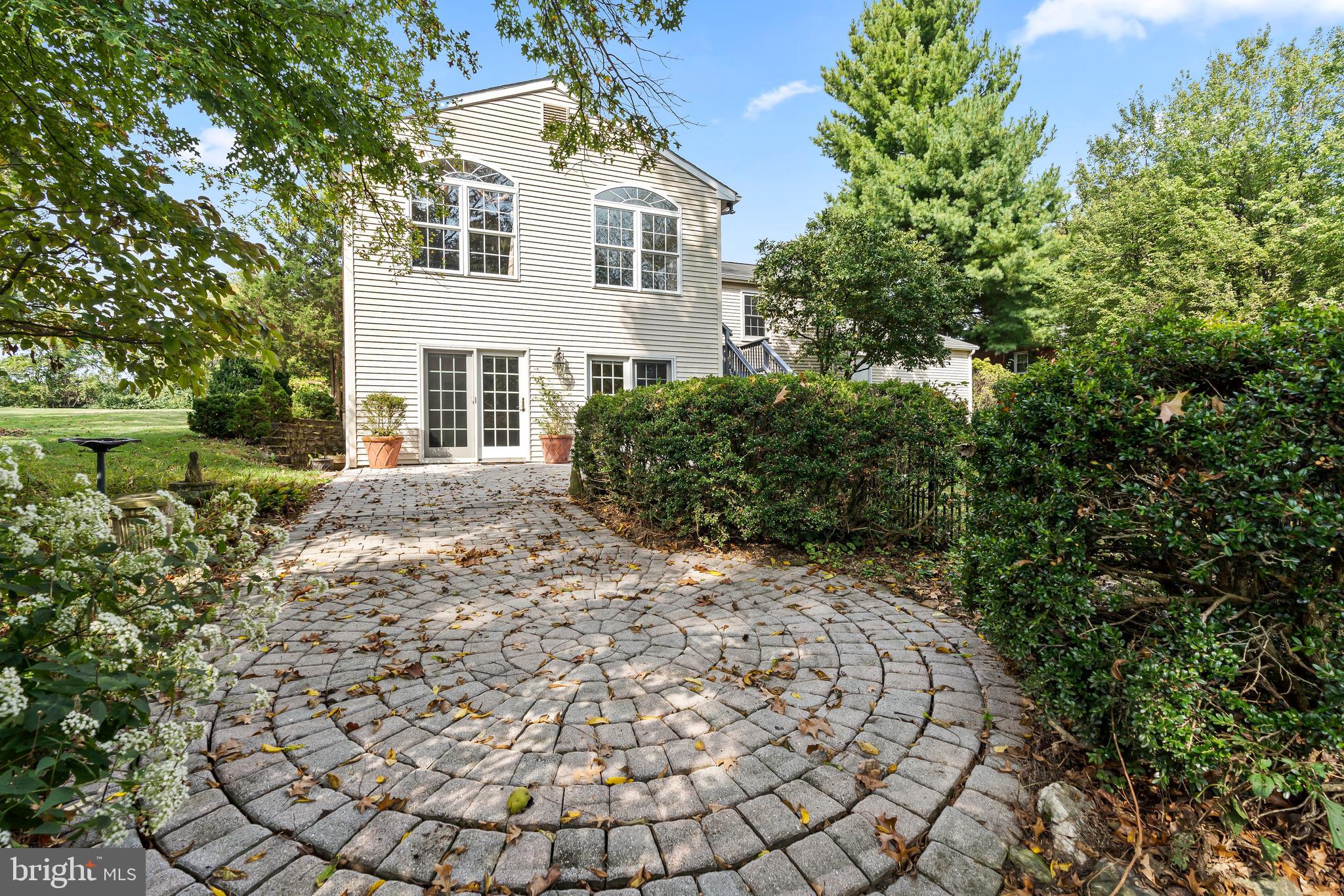 7705 Ridge Road Frederick, MD 21702 - Photo 42 of 51 a view of a house with a yard