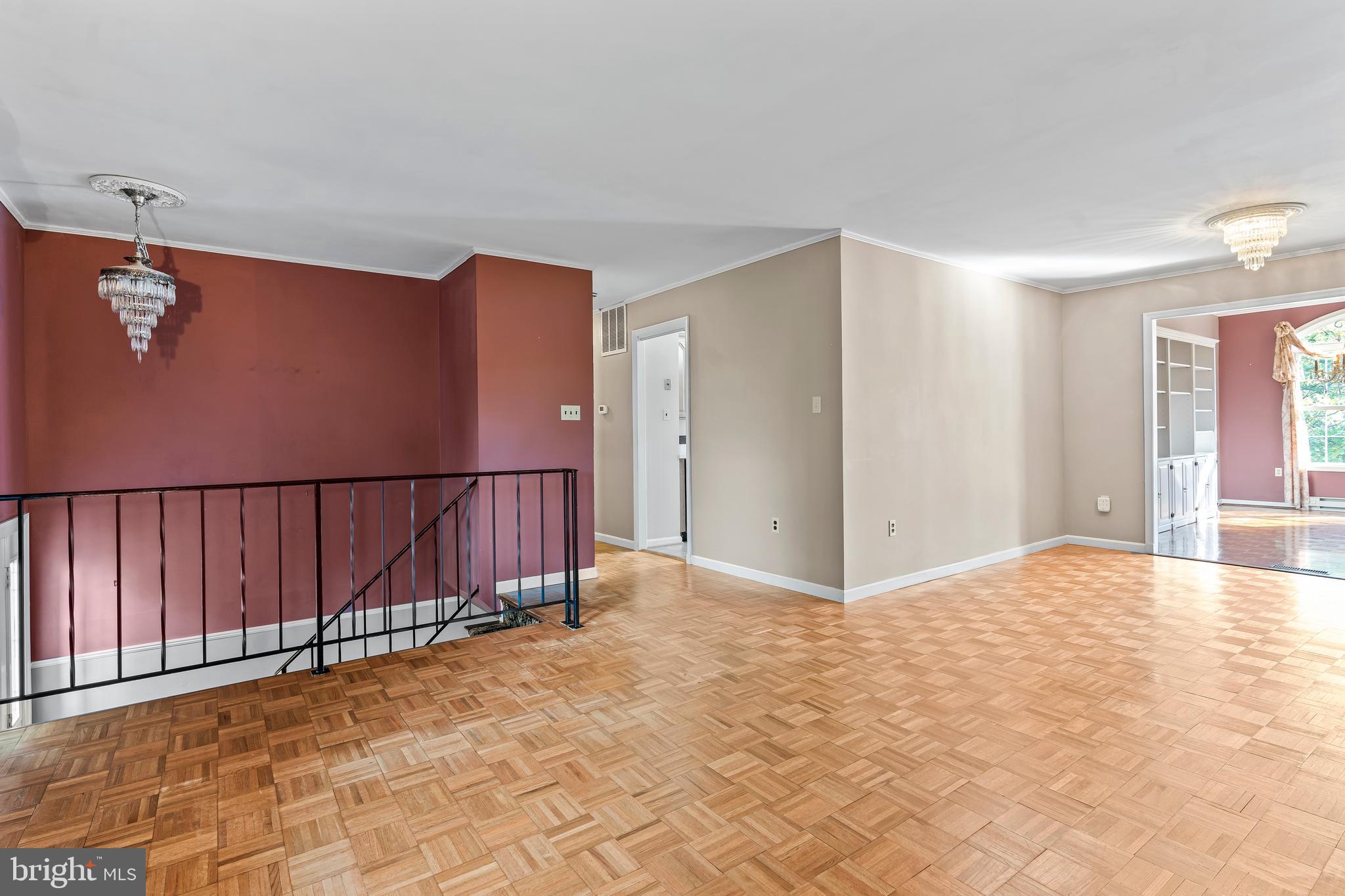 7705 Ridge Road Frederick, MD 21702 - Photo 6 of 51 a view of a livingroom with entryway and stairs