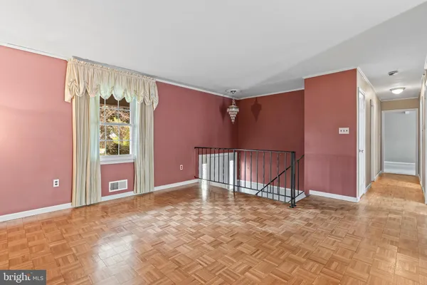a view of livingroom with furniture and a window
