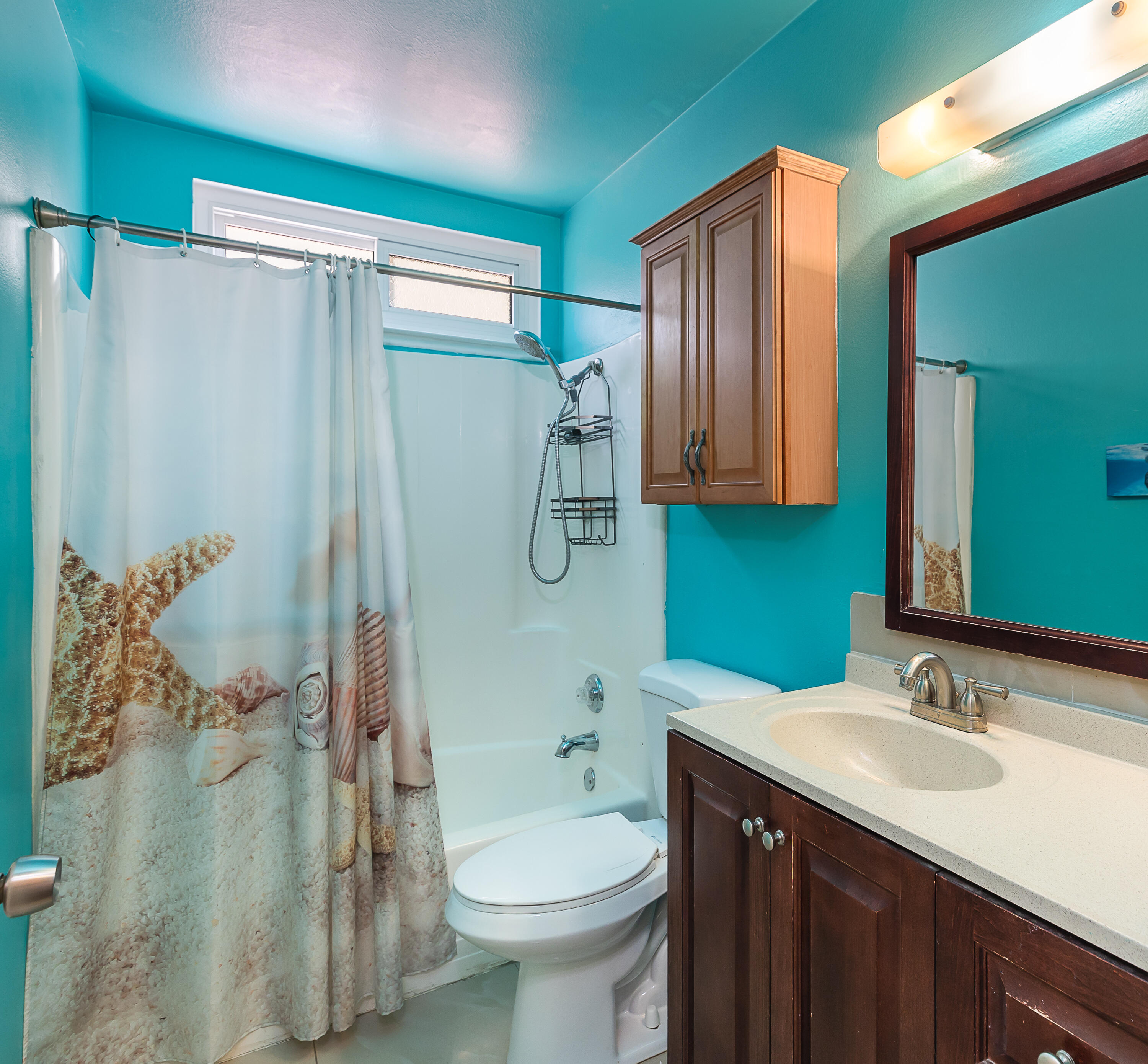 224 Hillview Drive Goleta, CA 93117 - Photo 16 of 20 a bathroom with a sink toilet and shower