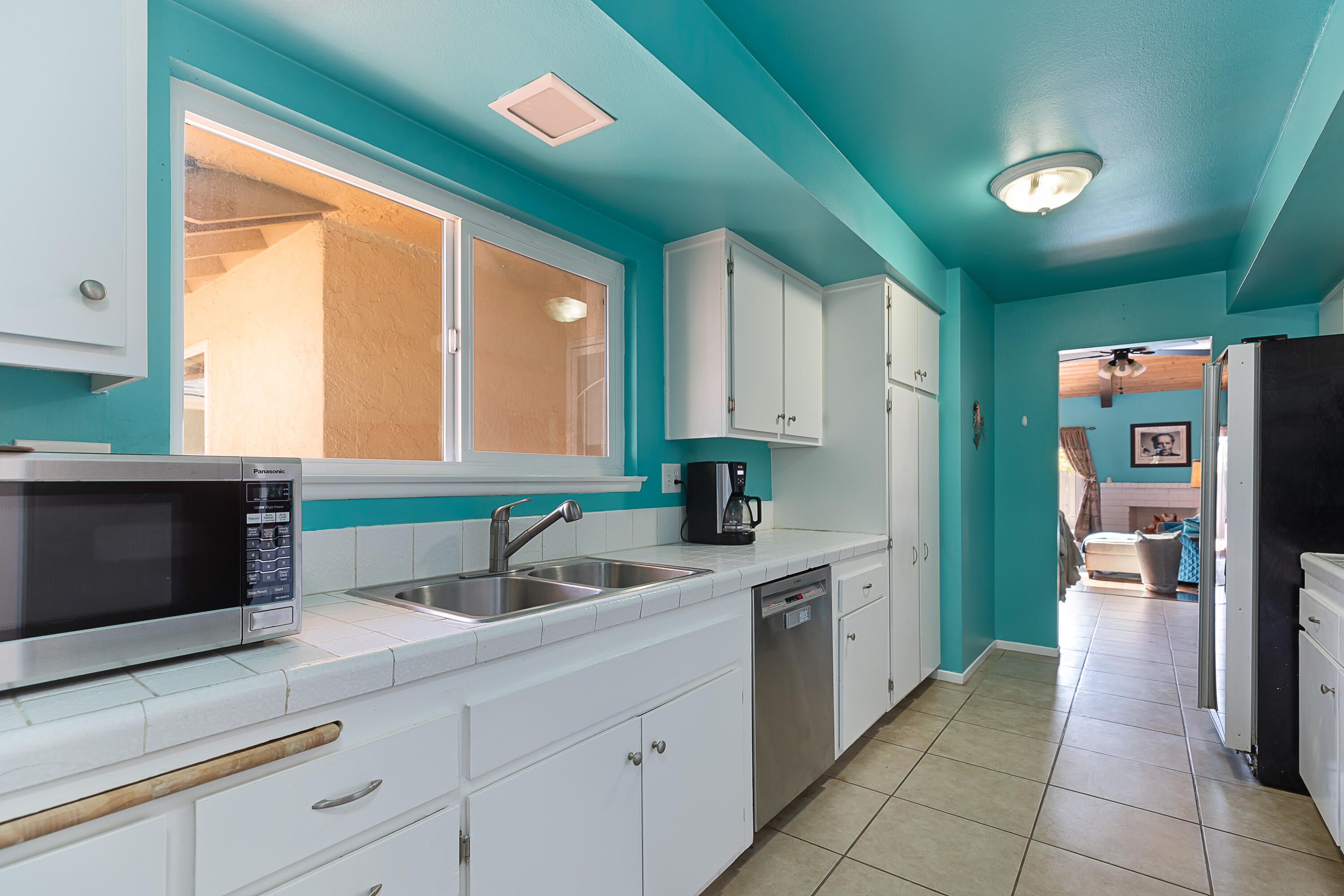 224 Hillview Drive Goleta, CA 93117 - Photo 7 of 20 a kitchen with stainless steel appliances granite countertop a sink and a cabinets