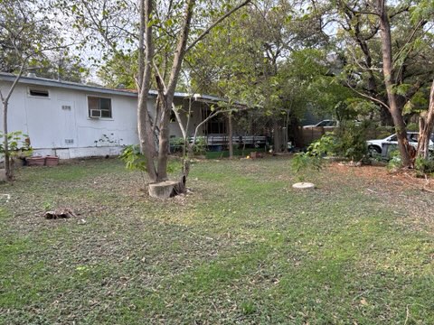 7802 Persimmon Trail Austin, TX 78745 - Photo 2 of 7 a view of a house with backyard