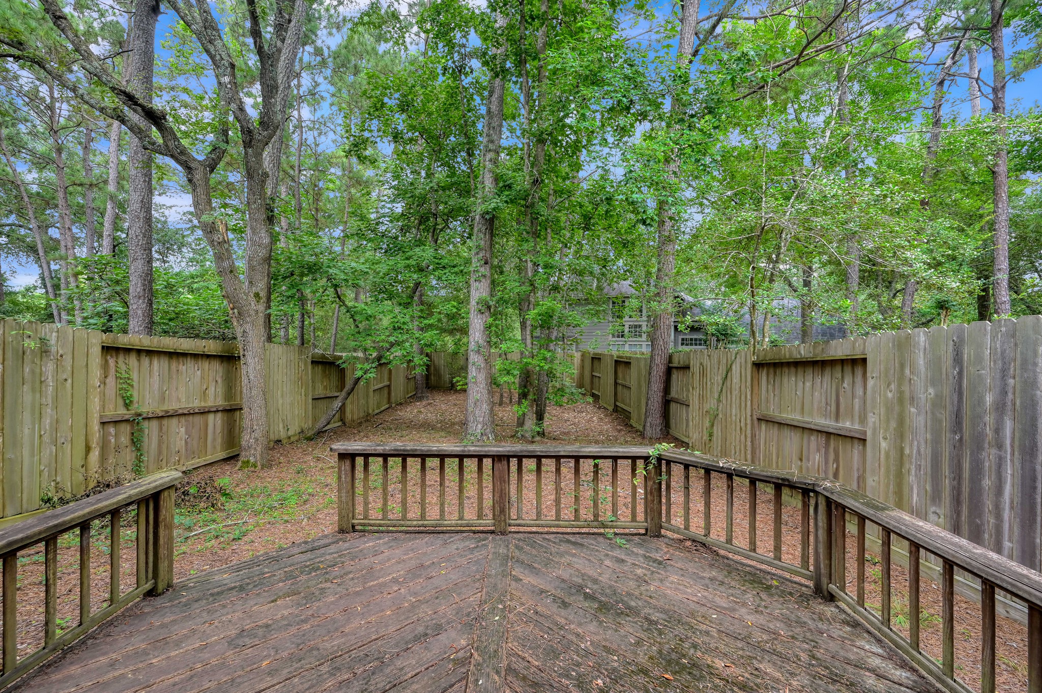 23 Alderon Woods Place Spring, TX 77382 - Photo 23 of 25 a view of a wooden fence
