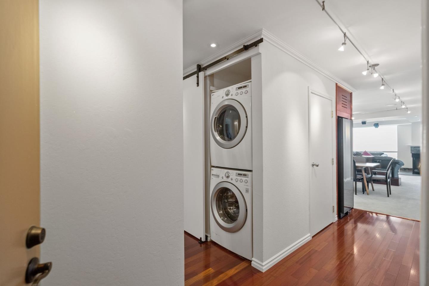 320 Vallejo Drive, Unit 41 Millbrae, CA 94030 - Photo 11 of 37 a view of a hallway with washer and dryer