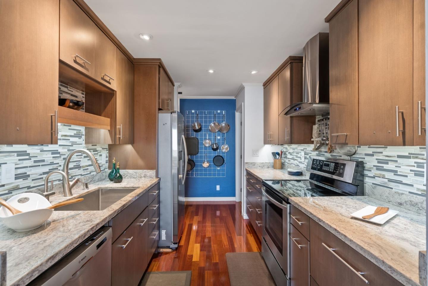 320 Vallejo Drive, Unit 41 Millbrae, CA 94030 - Photo 13 of 37 a kitchen with granite countertop stainless steel appliances and wooden cabinets