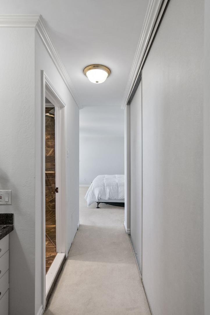 320 Vallejo Drive, Unit 41 Millbrae, CA 94030 - Photo 22 of 37 a view of a bedroom from a hallway