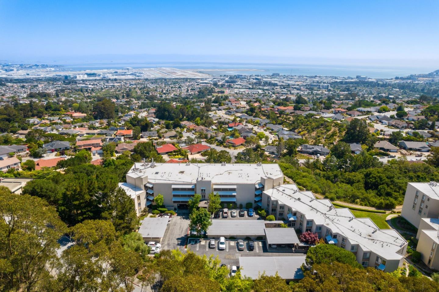 320 Vallejo Drive, Unit 41 Millbrae, CA 94030 - Photo 4 of 37 an aerial view of a city with lots of residential buildings