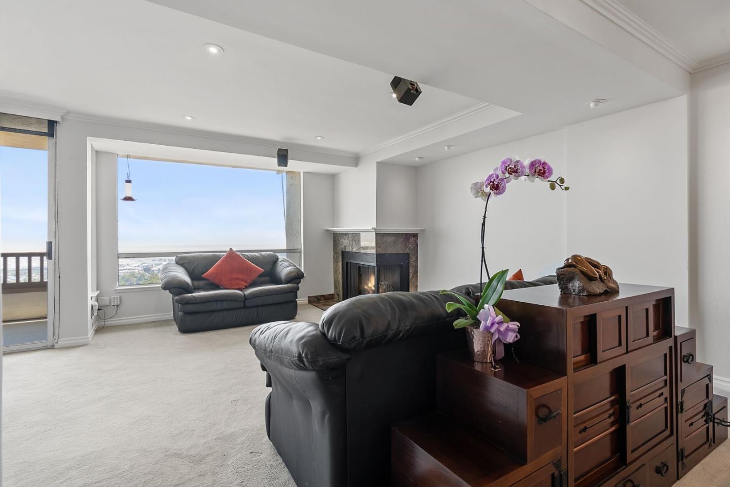 320 Vallejo Drive, Unit 41 Millbrae, CA 94030 - Photo 7 of 37 a living room with furniture and a flat screen tv