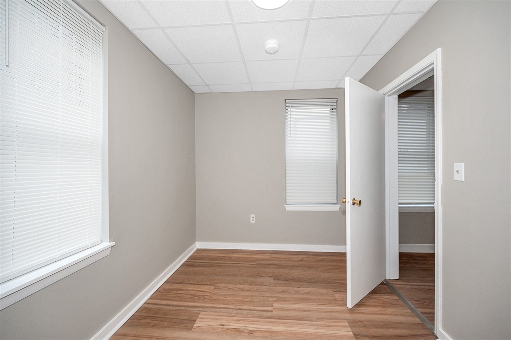 90 Appleton Street, Unit U:7 Lowell, MA 01852 - Photo 6 of 13 a view of hallway with wooden floor