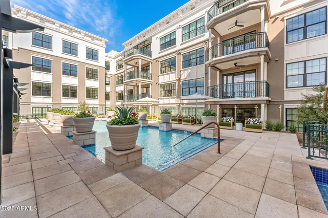 a front view of building with outdoor seating