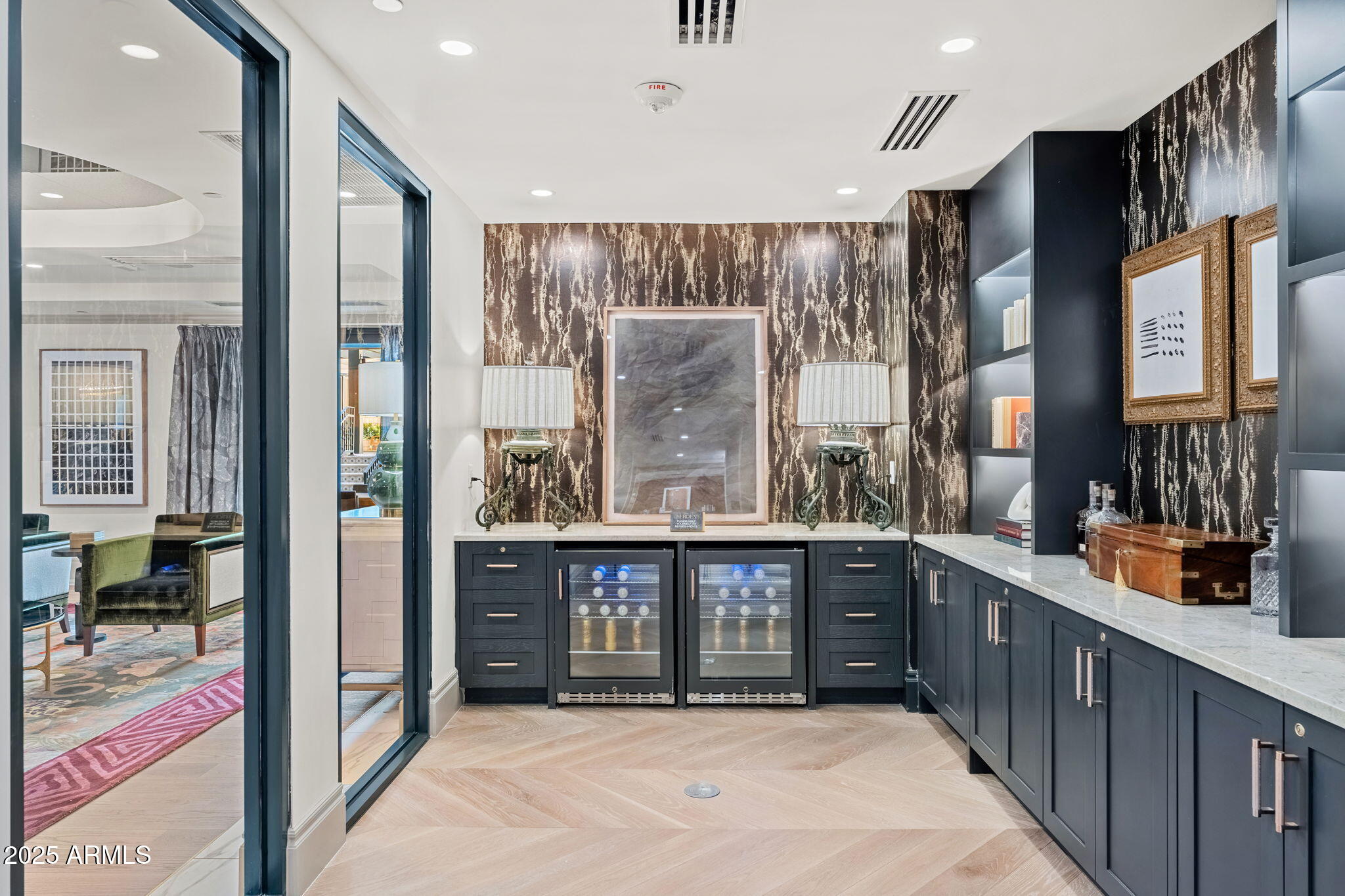 4240 East Camelback Road, Unit 304 Phoenix, AZ 85018 - Photo 7 of 12 a kitchen with stainless steel appliances granite countertop a refrigerator and a sink