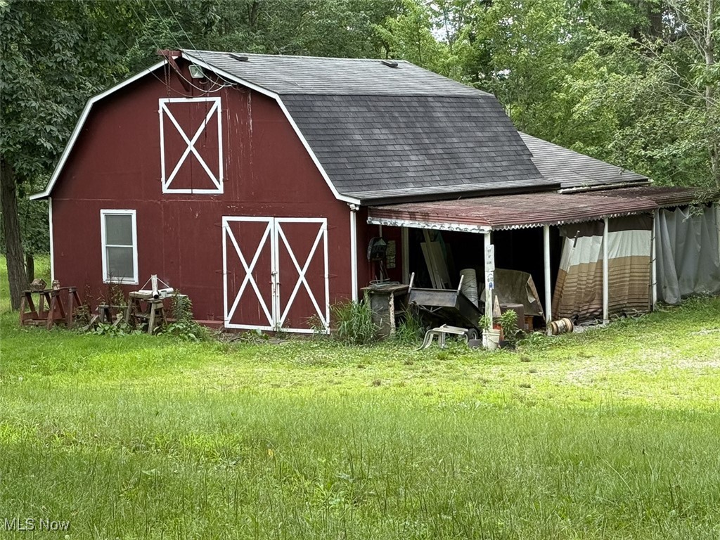 7840 Carter Road Northfield, OH 44067 - Photo 9 of 15 View of barn with a yard