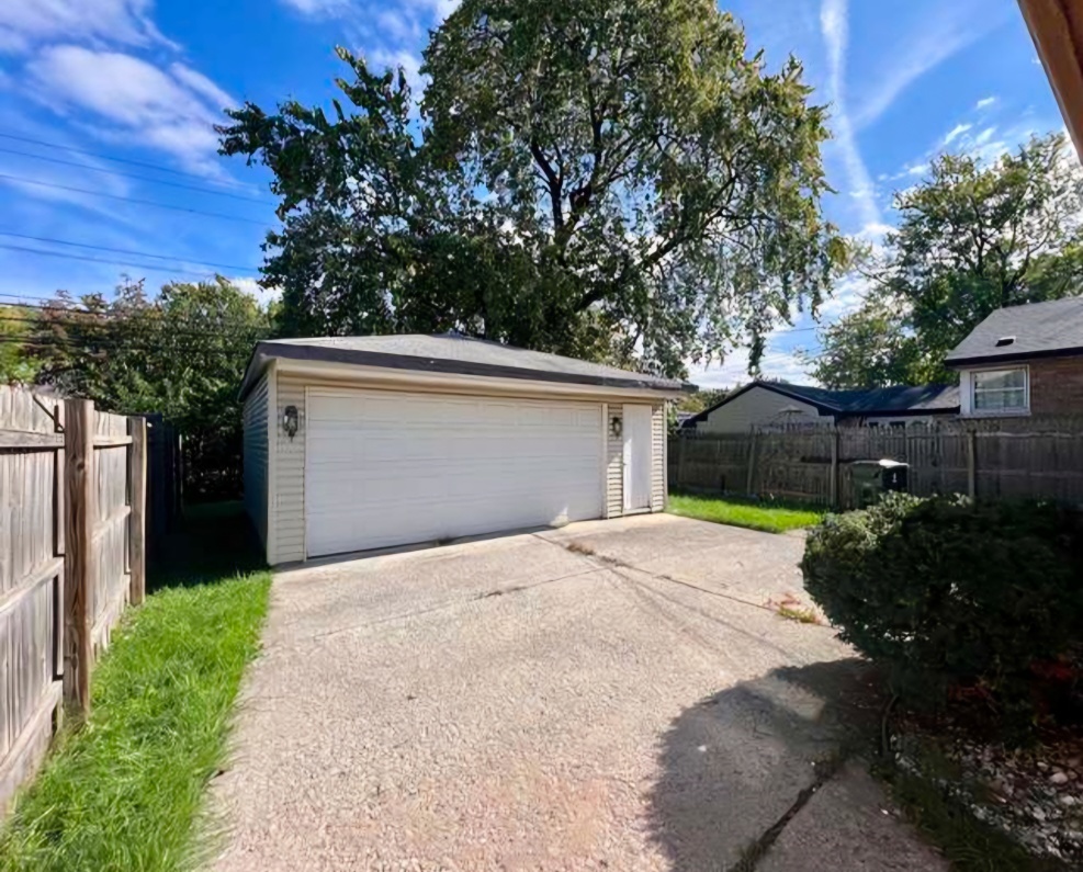 15041 Cottage Grove Avenue Dolton, IL 60419 - Photo 11 of 11 a front view of house with pathway and yard