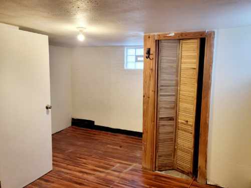 15041 Cottage Grove Avenue Dolton, IL 60419 - Photo 9 of 11 a view of hallway with wooden floor