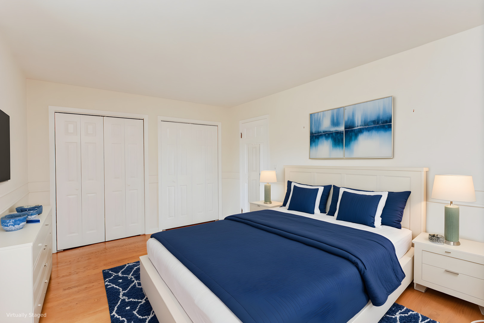 590 Green Bay Road Glencoe, IL 60022 - Photo 16 of 33 a bedroom with a bed and a painting on the wall