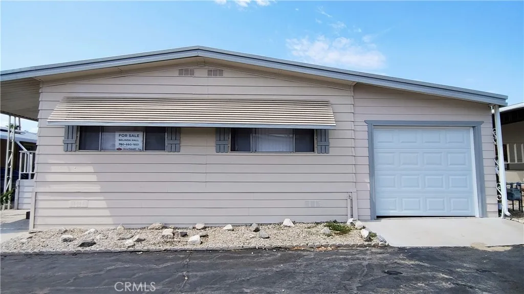 17640 Corkill Road, Unit 78 Desert Hot Springs, CA 92241 - Photo 2 of 58 Garage door front