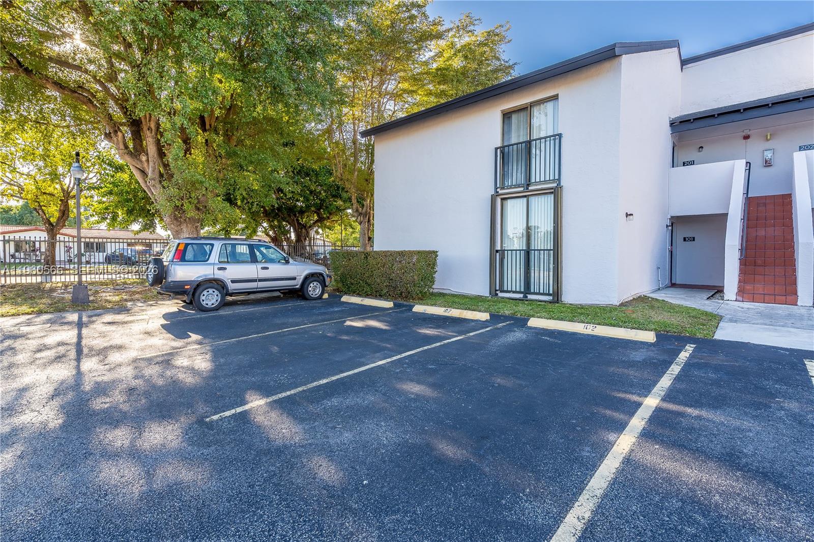 6795 Southwest 132nd Avenue, Unit 101 Miami, FL 33183 - Photo 15 of 37 a house view with a outdoor space
