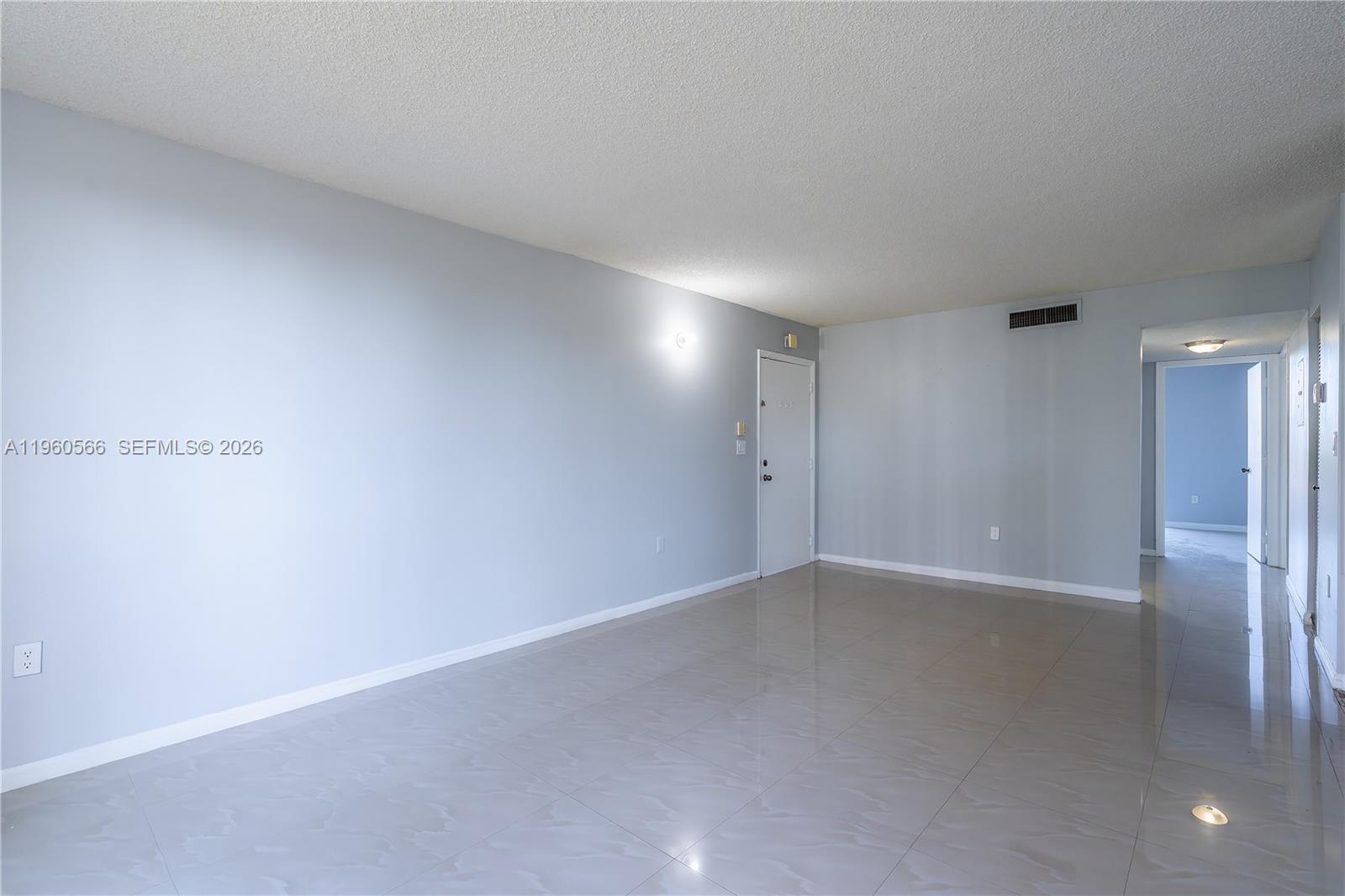 6795 Southwest 132nd Avenue, Unit 101 Miami, FL 33183 - Photo 7 of 37 a view of an empty room