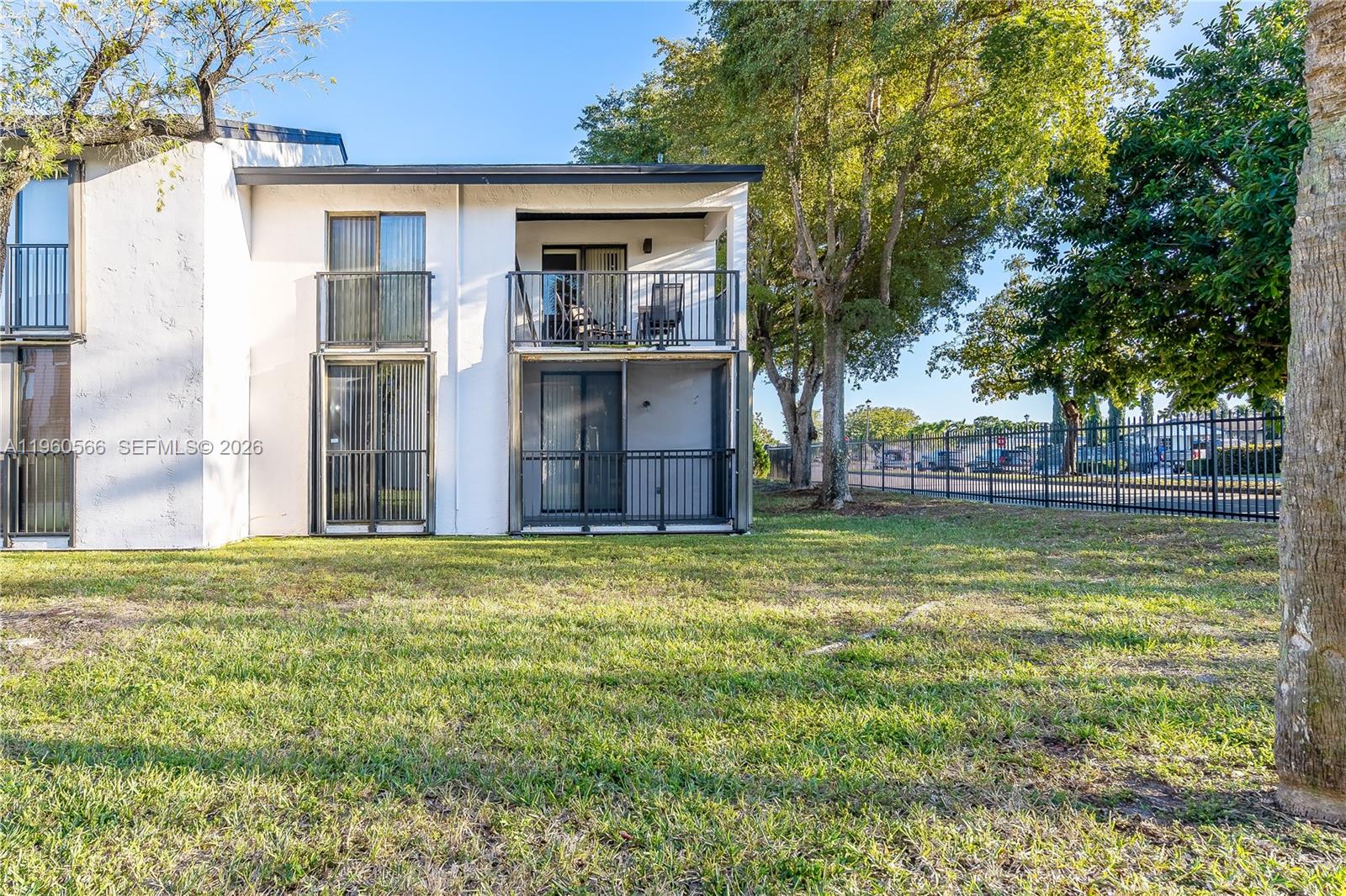 6795 Southwest 132nd Avenue, Unit 101 Miami, FL 33183 - Photo 10 of 37 a house with swimming pool