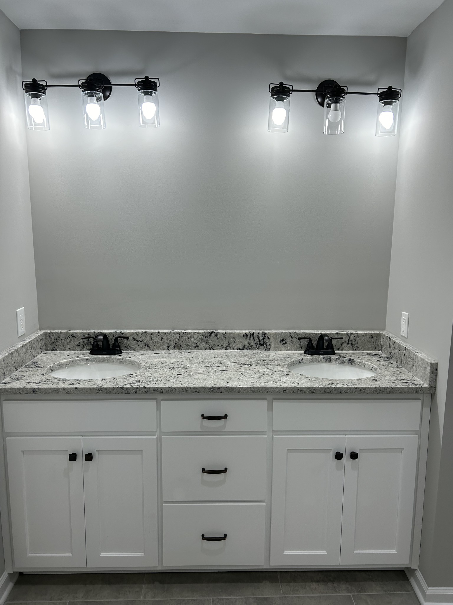 8512 Fredonia Road Manchester, TN 37355 - Photo 21 of 41 a bathroom with a granite countertop sink and a white cabinets