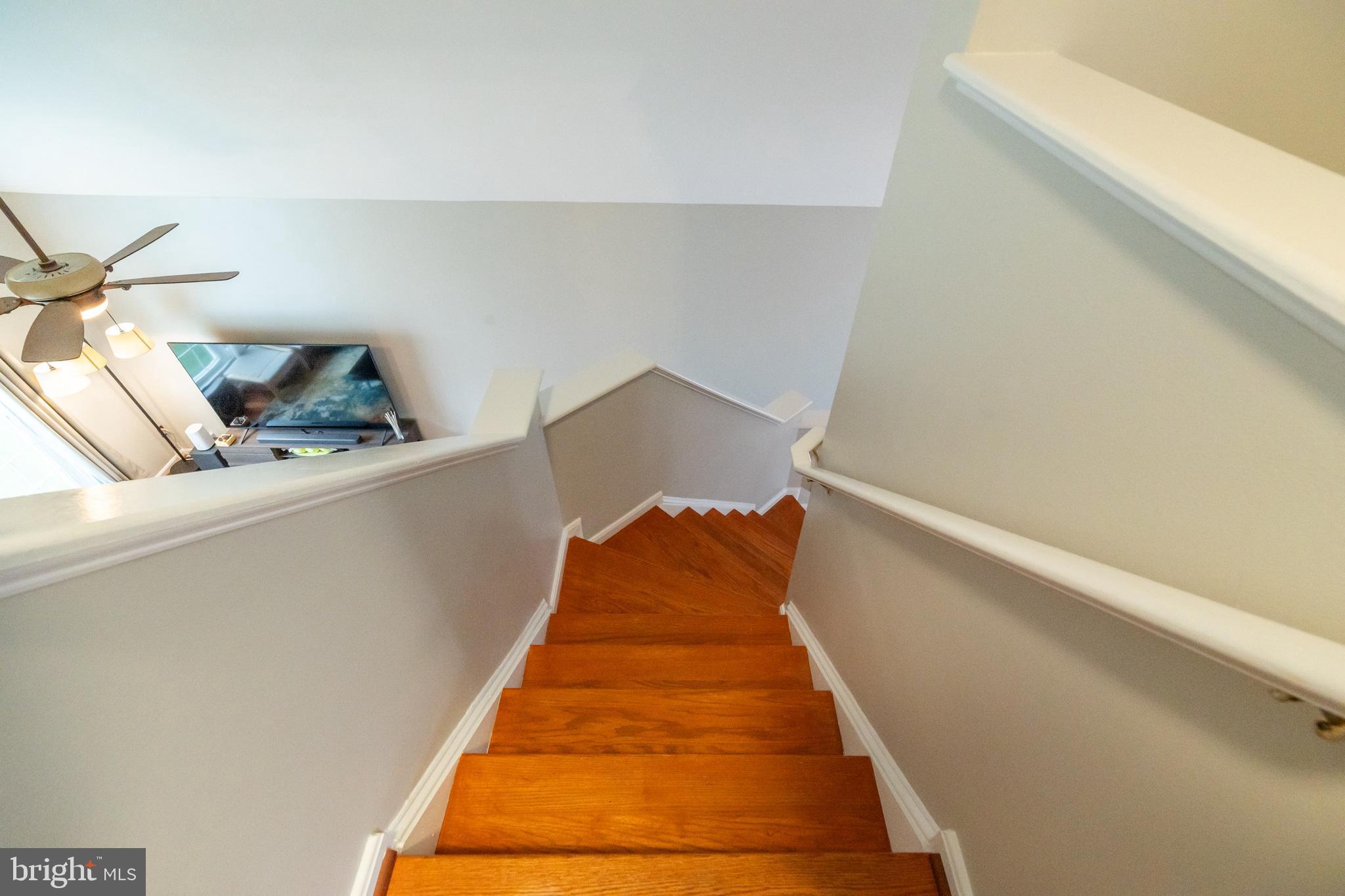 6005 Honnicut Drive Centreville, VA 20121 - Photo 12 of 29 a bed sitting in a bedroom next to a window