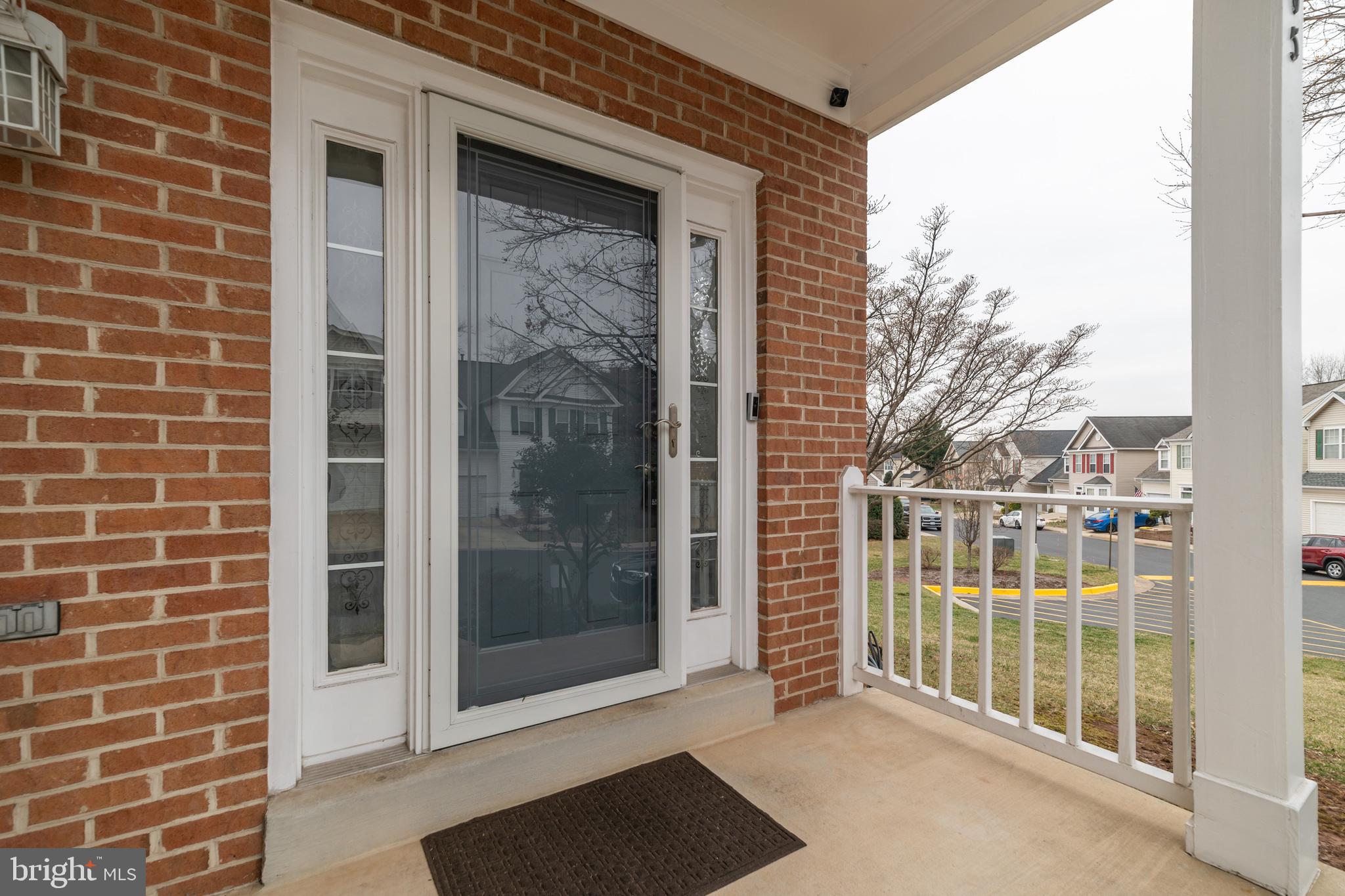 6005 Honnicut Drive Centreville, VA 20121 - Photo 25 of 29 a view of a balcony with a floor to ceiling window