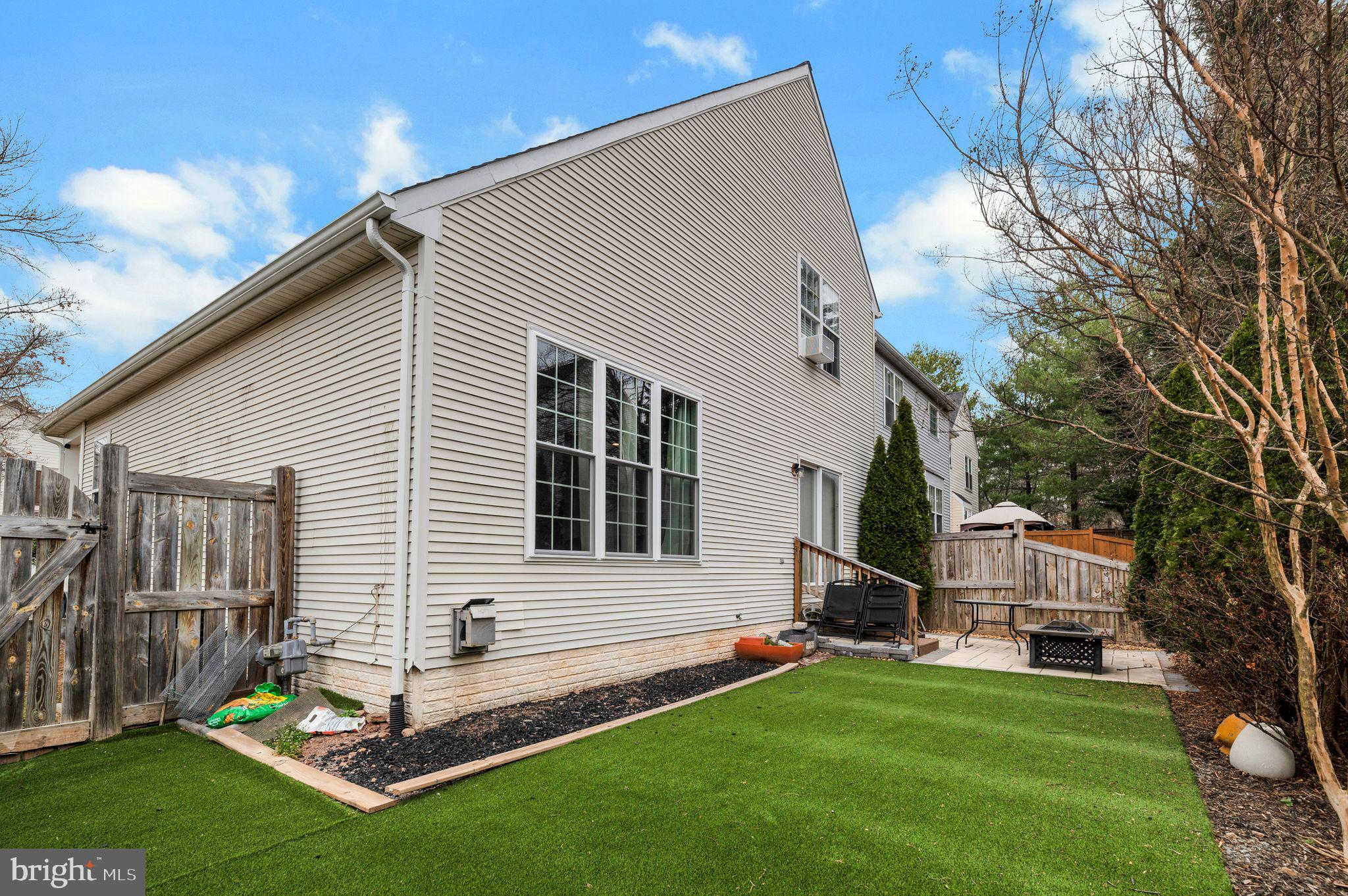 6005 Honnicut Drive Centreville, VA 20121 - Photo 28 of 29 a view of a house with a backyard
