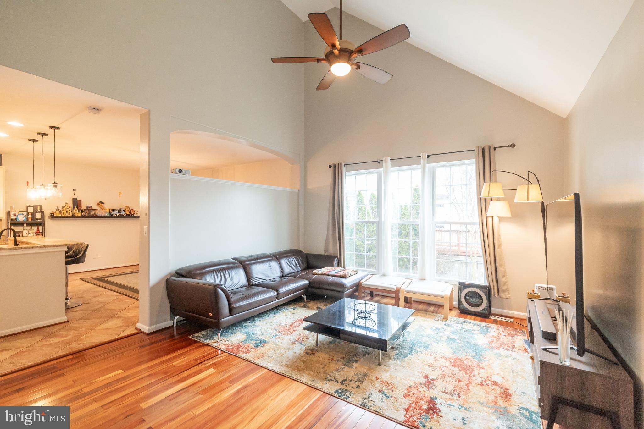 6005 Honnicut Drive Centreville, VA 20121 - Photo 7 of 29 a living room with furniture fireplace and a large window