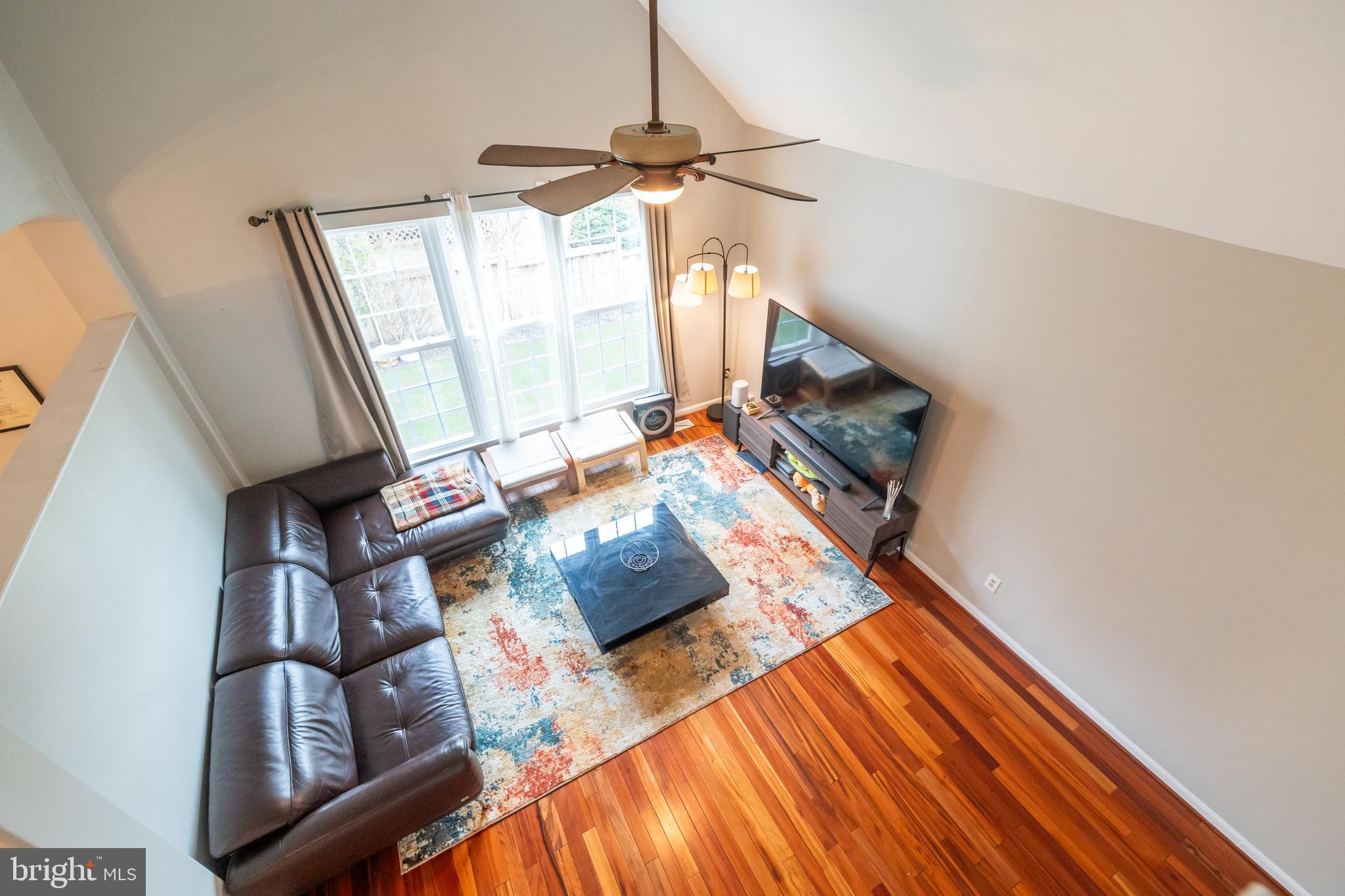 6005 Honnicut Drive Centreville, VA 20121 - Photo 9 of 29 a living room with furniture and a fireplace