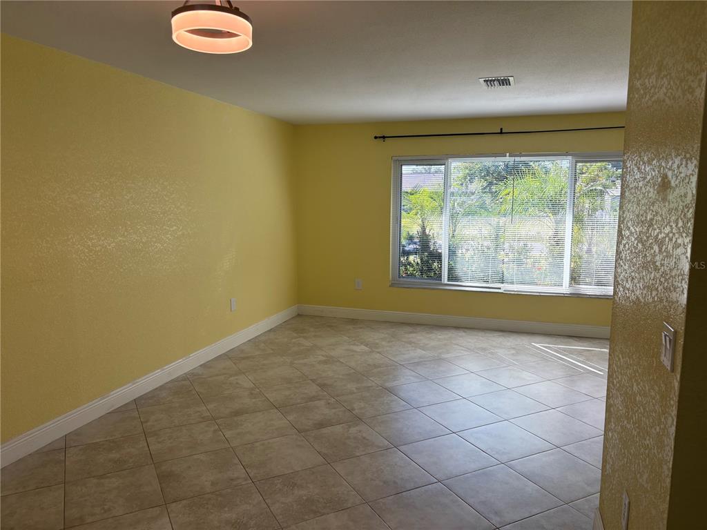 1117 Angela Maria Road Sarasota, FL 34243 - Photo 16 of 52 a view of empty room with a window