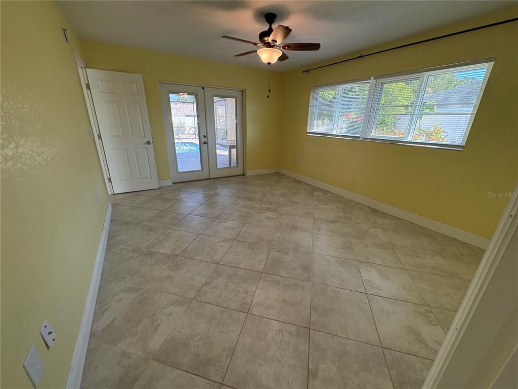 1117 Angela Maria Road Sarasota, FL 34243 - Photo 31 of 52 a view of an empty room with a window