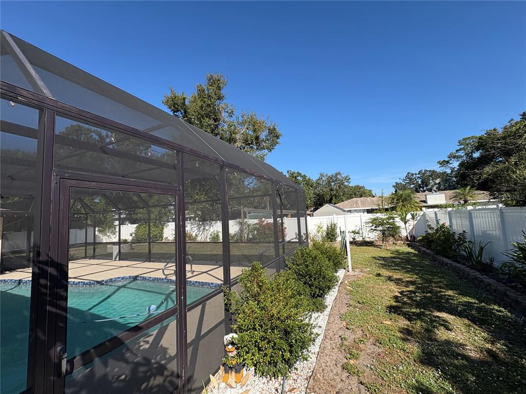 1117 Angela Maria Road Sarasota, FL 34243 - Photo 44 of 52 a view of a backyard