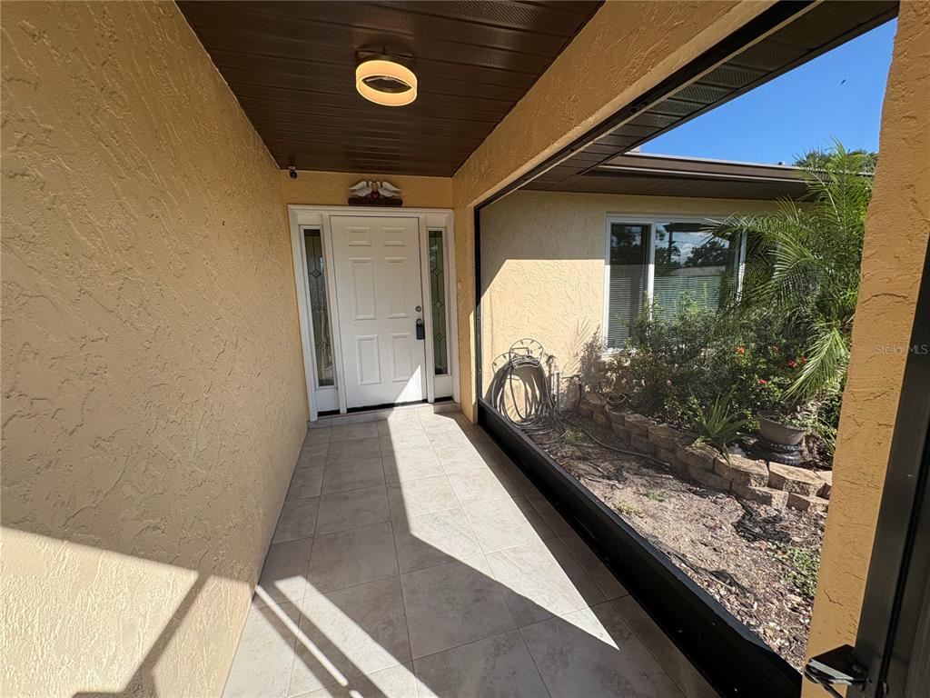 1117 Angela Maria Road Sarasota, FL 34243 - Photo 50 of 52 a view of a car park from a window