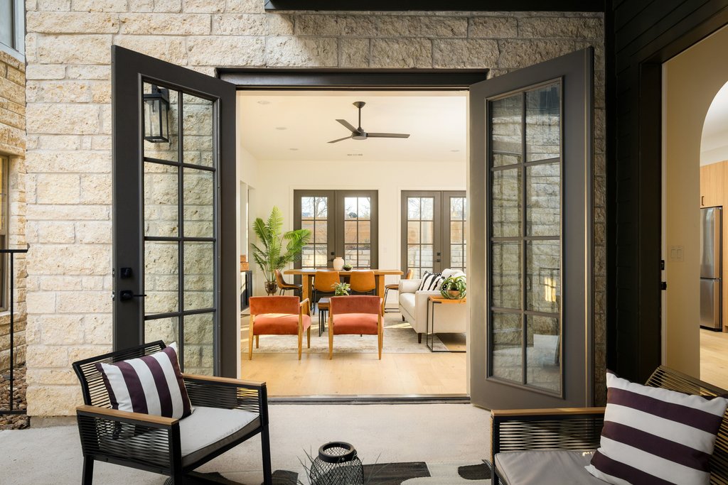 3500 Pecan Springs Road, Unit 13 Austin, TX 78723 - Photo 1 of 33 Hacienda East offers beautiful private courtyards with French doors opening to the living space.