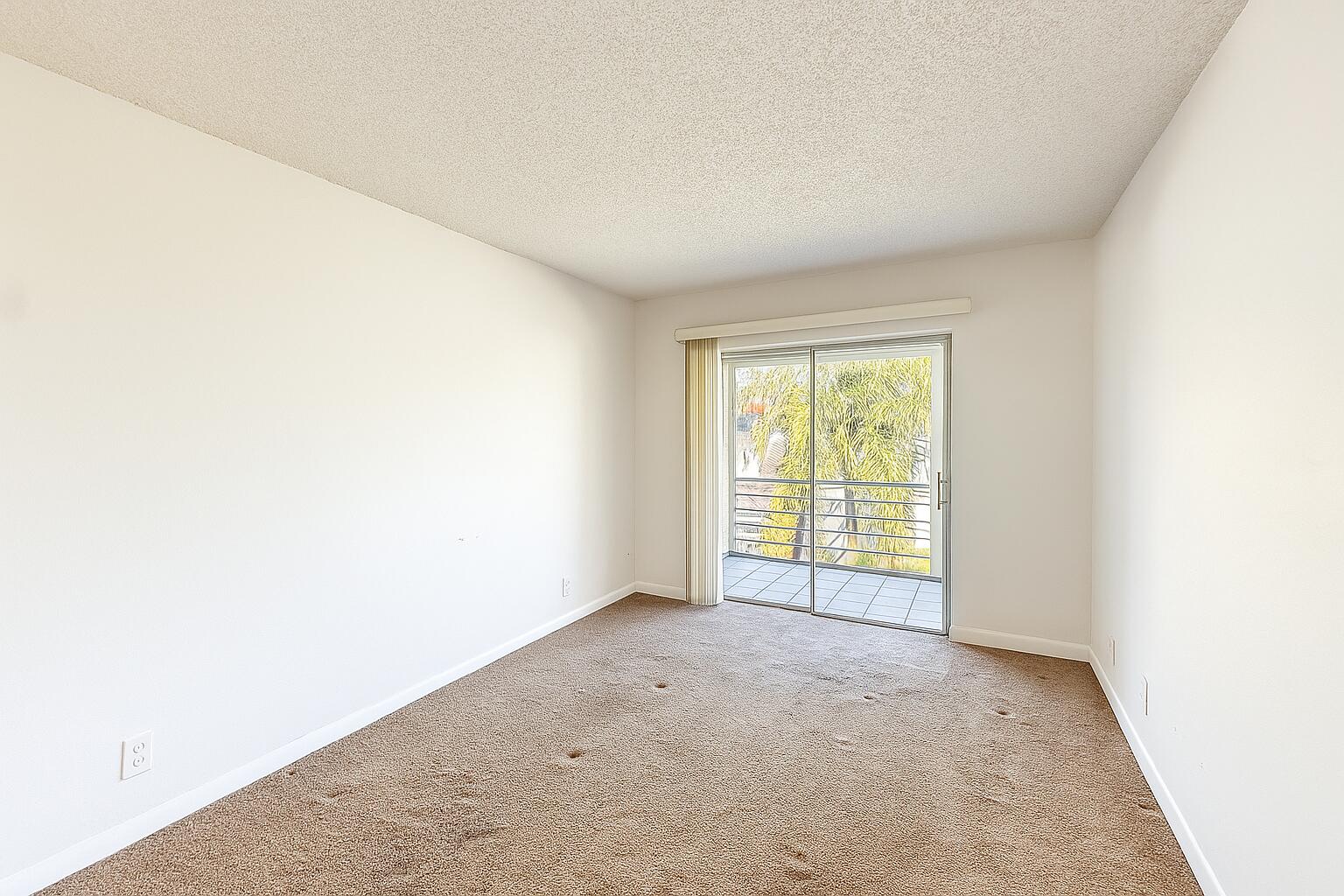 3000 Springdale Boulevard, Unit V303 Palm Springs, FL 33461 - Photo 16 of 22 a view of an empty room with a window