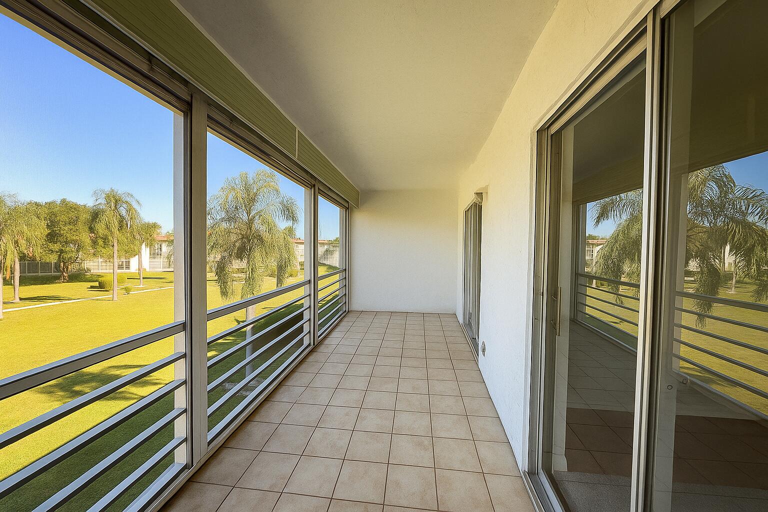 3000 Springdale Boulevard, Unit V303 Palm Springs, FL 33461 - Photo 3 of 22 a view of a balcony