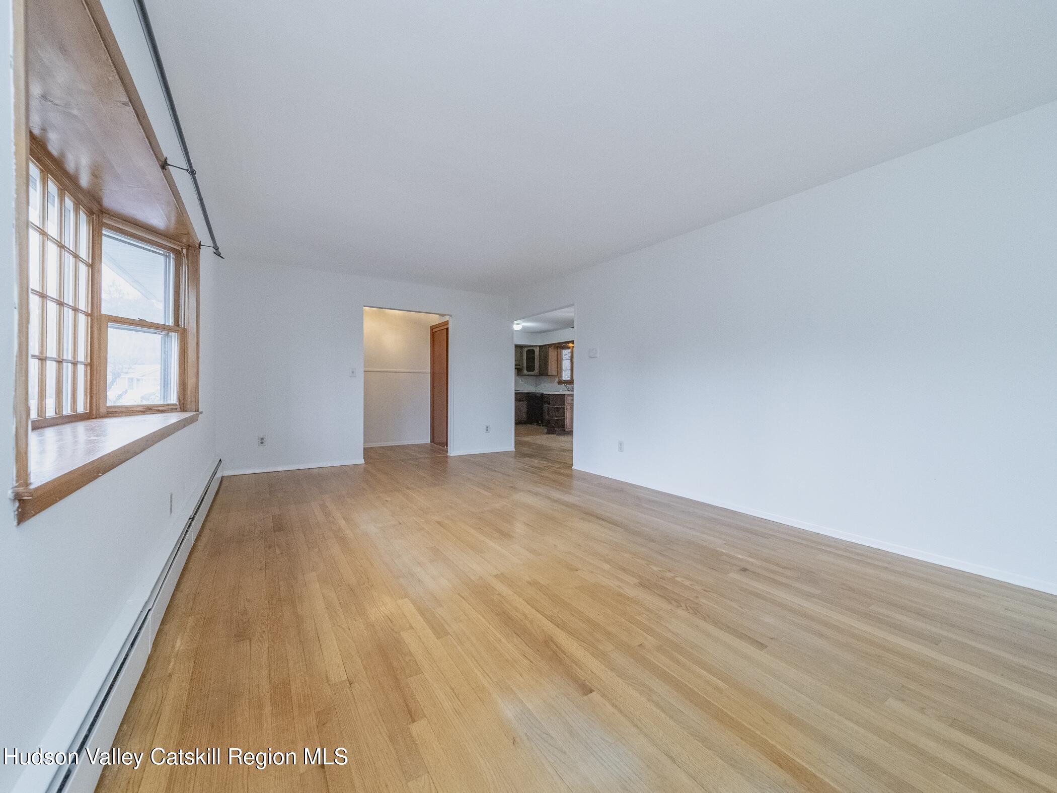 30 Redwood Road Saugerties, NY 12477 - Photo 5 of 31 a view of empty room with wooden floor and fan