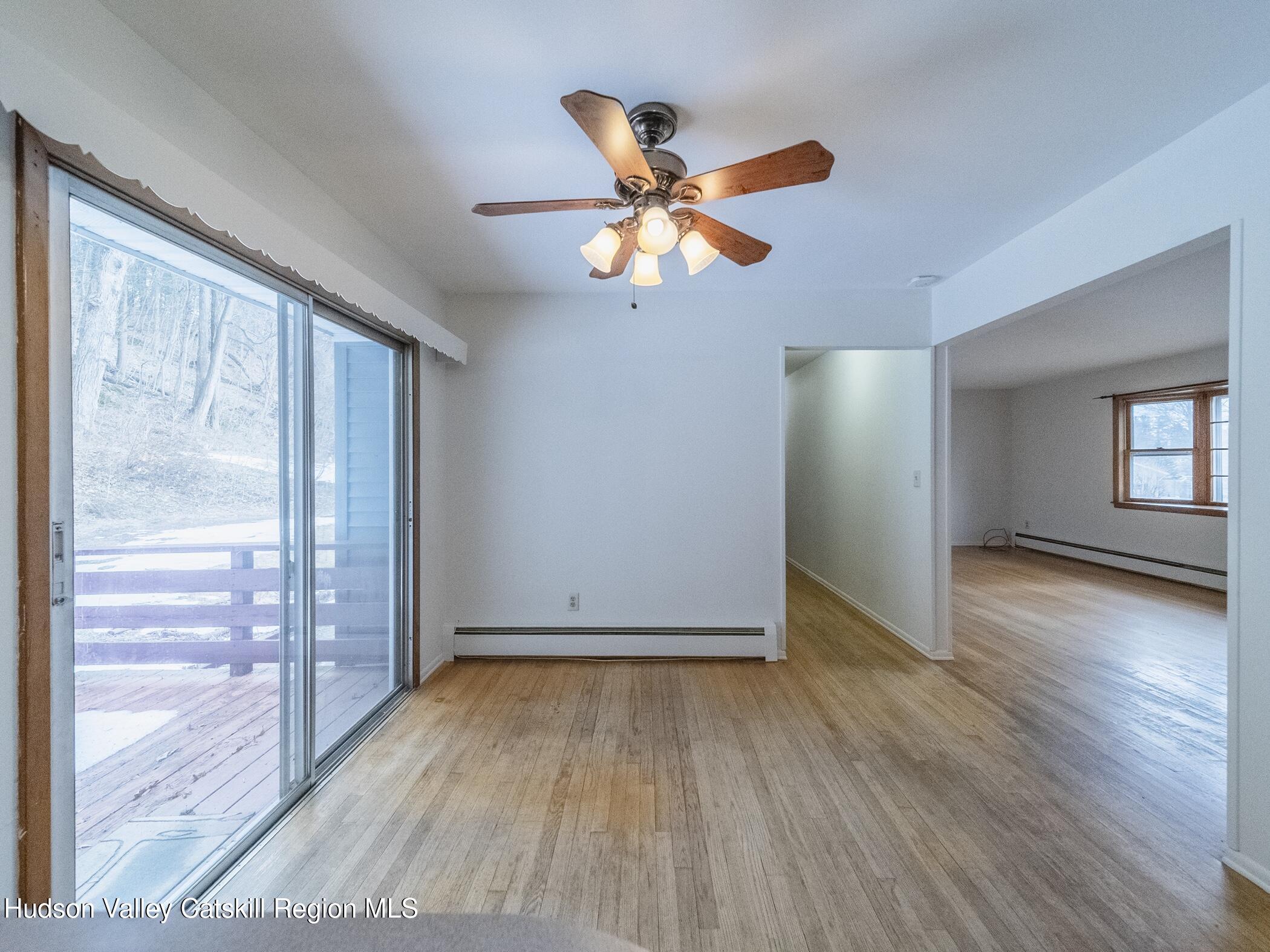 30 Redwood Road Saugerties, NY 12477 - Photo 10 of 31 wooden floor in an empty room with a window