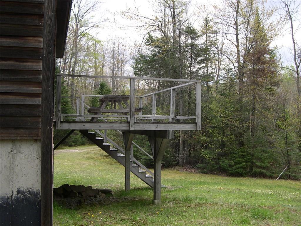 49 Dill Road Phillips, ME 04966 - Photo 6 of 30 backside of deck