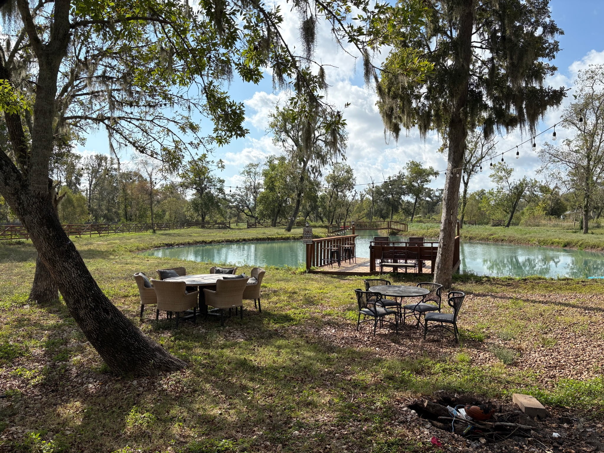 4915 West Farm To Market 1462 Rosharon, TX 77583 - Photo 4 of 17 a view of a lake with outdoor seating