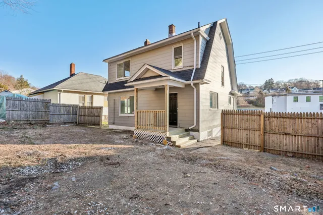 a front view of a house with a porch